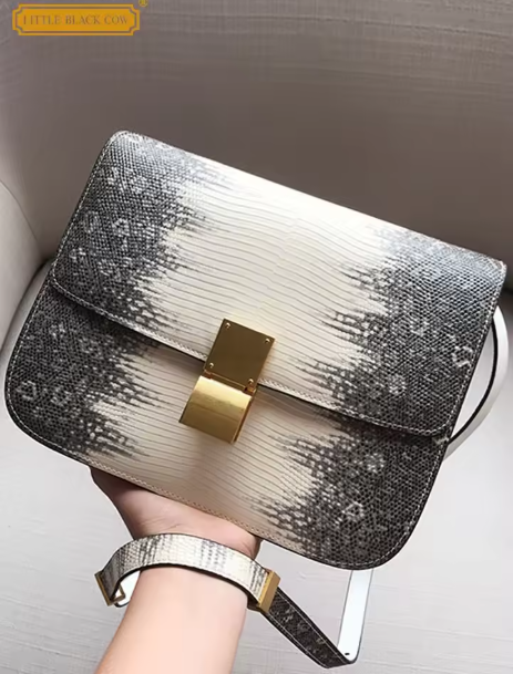 女性時尚肩背包  開合方式：翻蓋 款式：設計師豆腐盒包 材質：牛皮 適用場合：高街風格斜背包